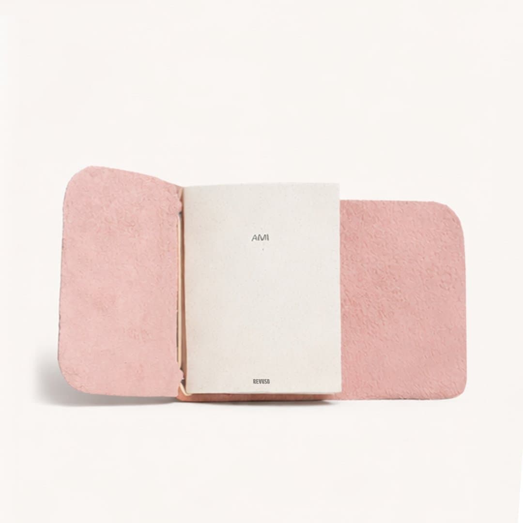 AMI journal, open, pink leather cover